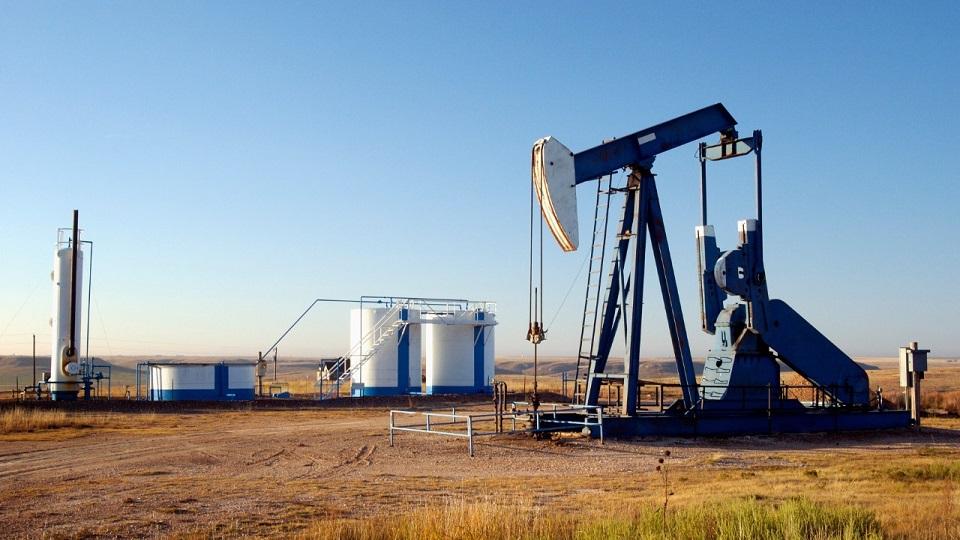 Oil well and storage tanks